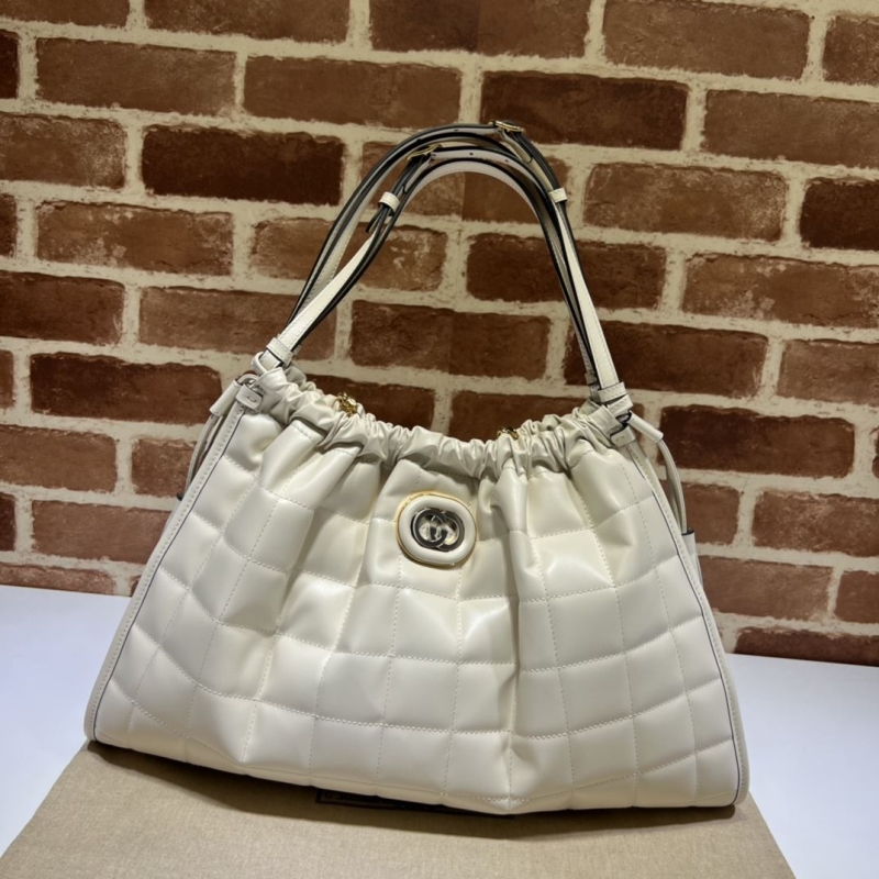 G*u*i top handle bags